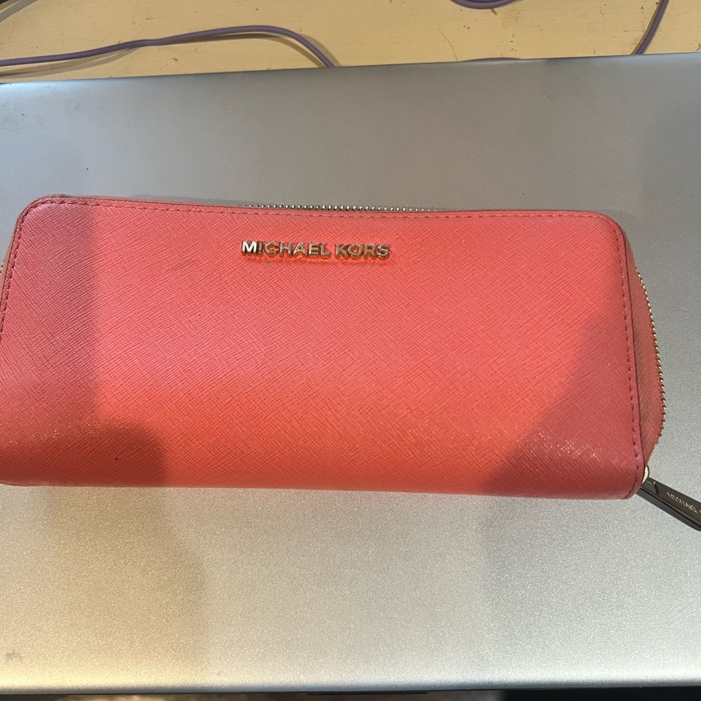 Michael Kors check book style wallet Peach  color gently  Used